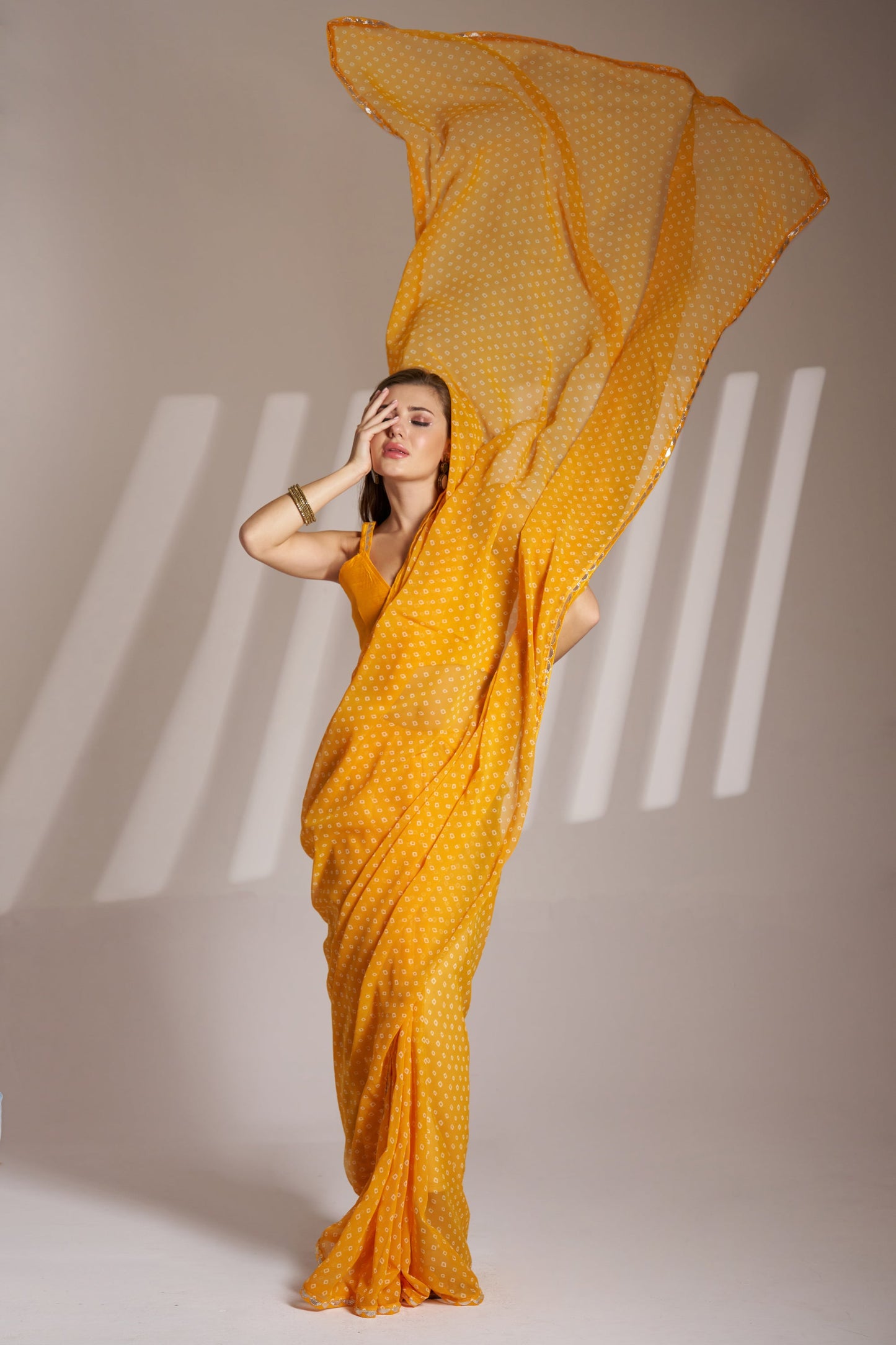 Yellow Georgette Laheriya Print Party Wear Saree with Fancy Lace