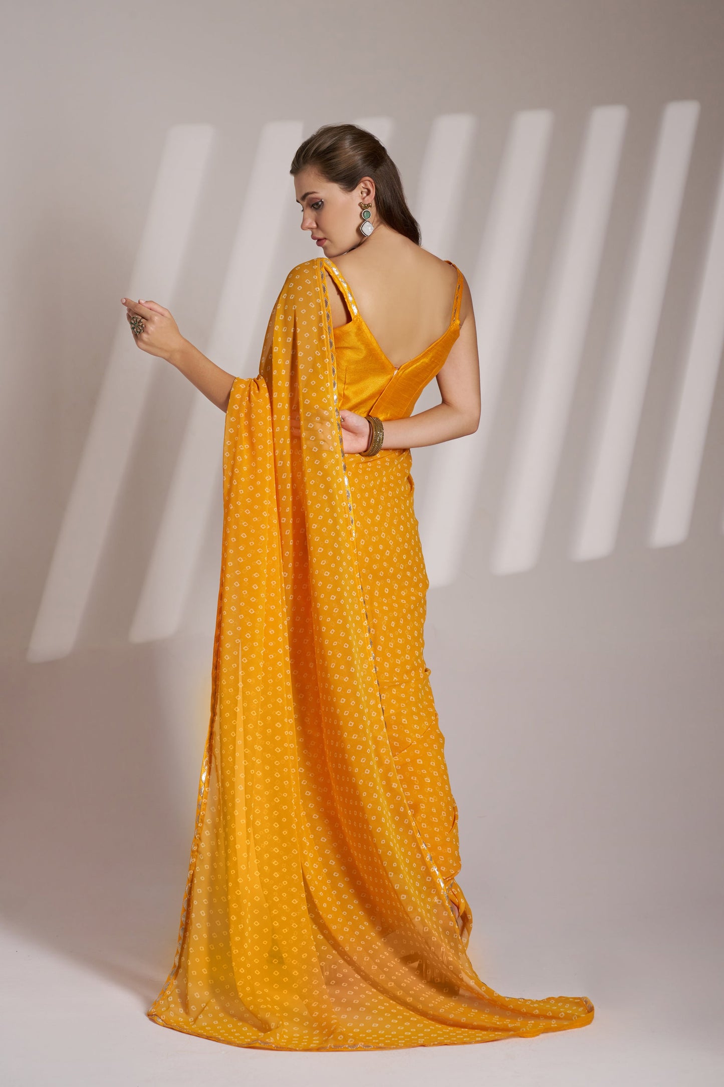 Yellow Georgette Laheriya Print Party Wear Saree with Fancy Lace