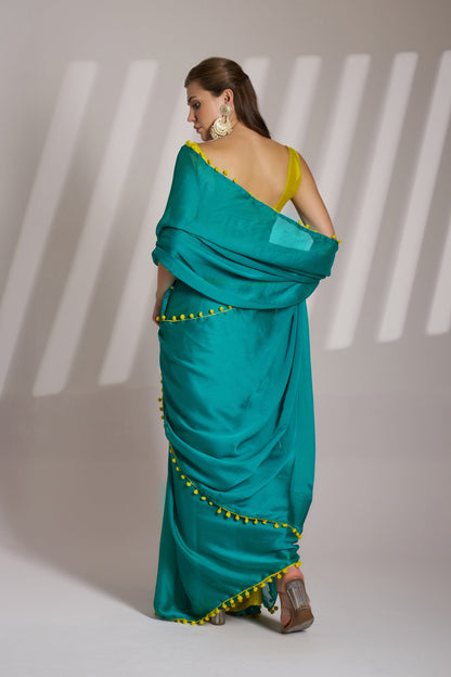 Sea Green color chiffon fabric saree with designer lace and unstitched blouse