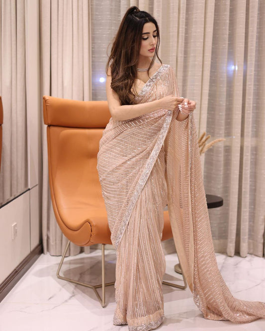 Stunning Peach Color Georgette Saree